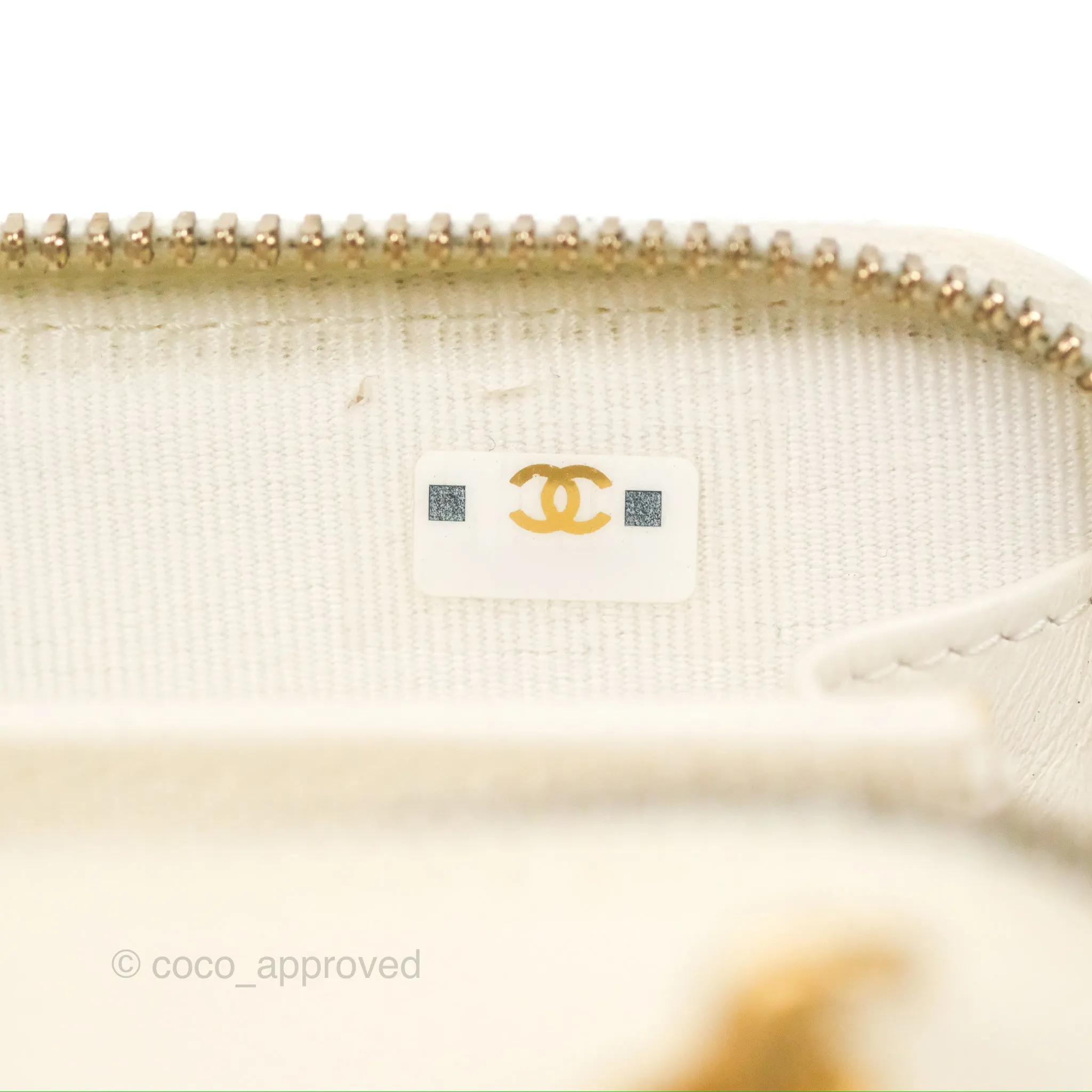Chanel Mini Boy Clutch with Chain White Caviar Aged Gold Hardware