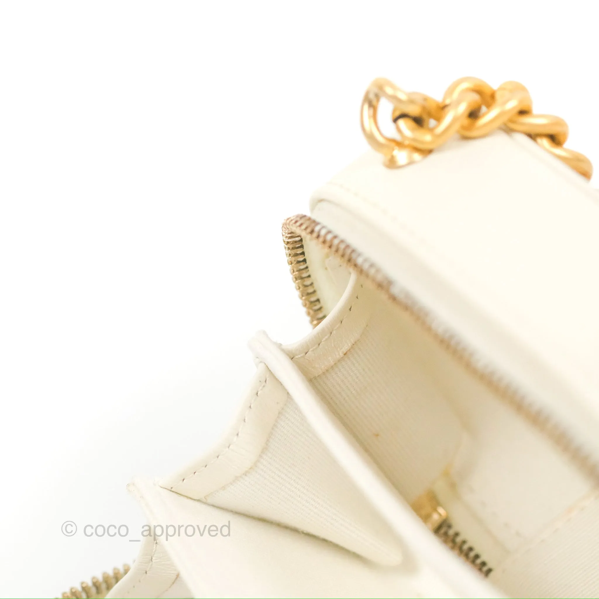 Chanel Mini Boy Clutch with Chain White Caviar Aged Gold Hardware
