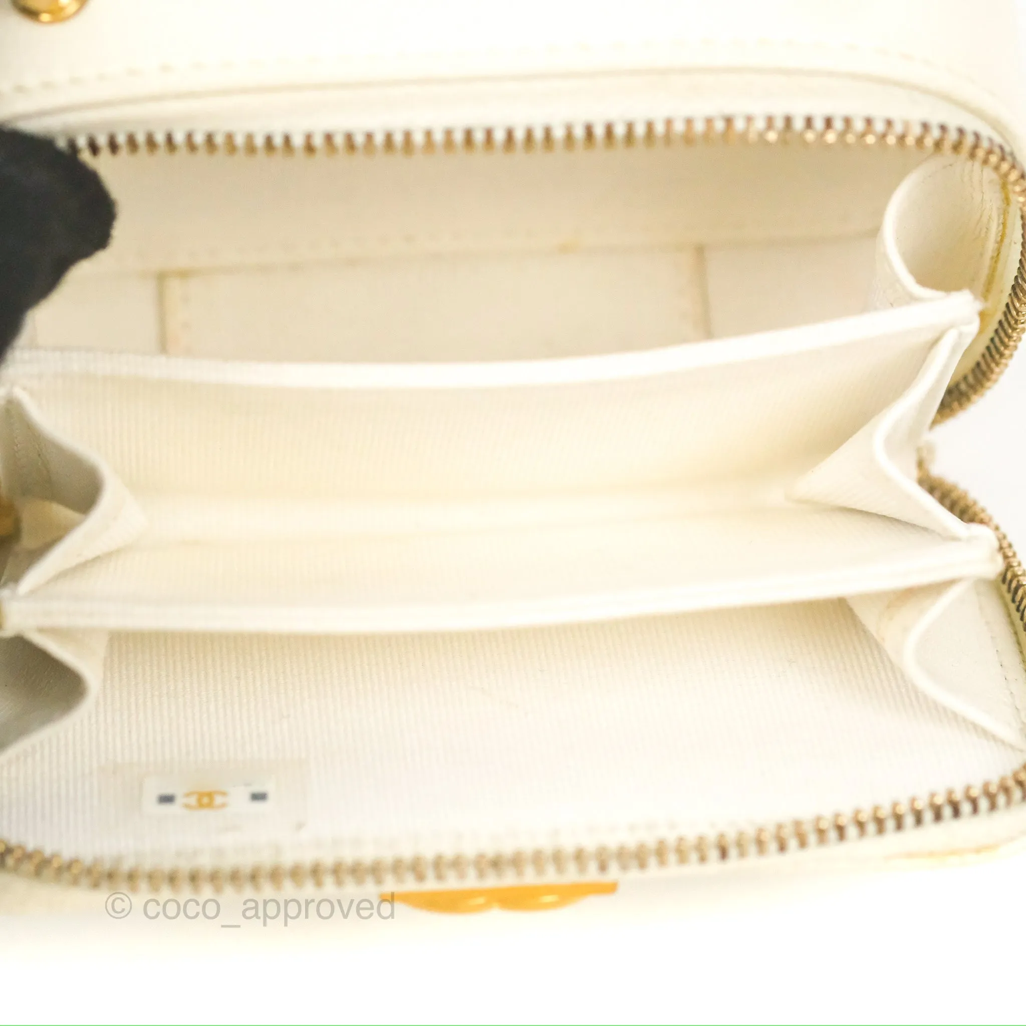 Chanel Mini Boy Clutch with Chain White Caviar Aged Gold Hardware