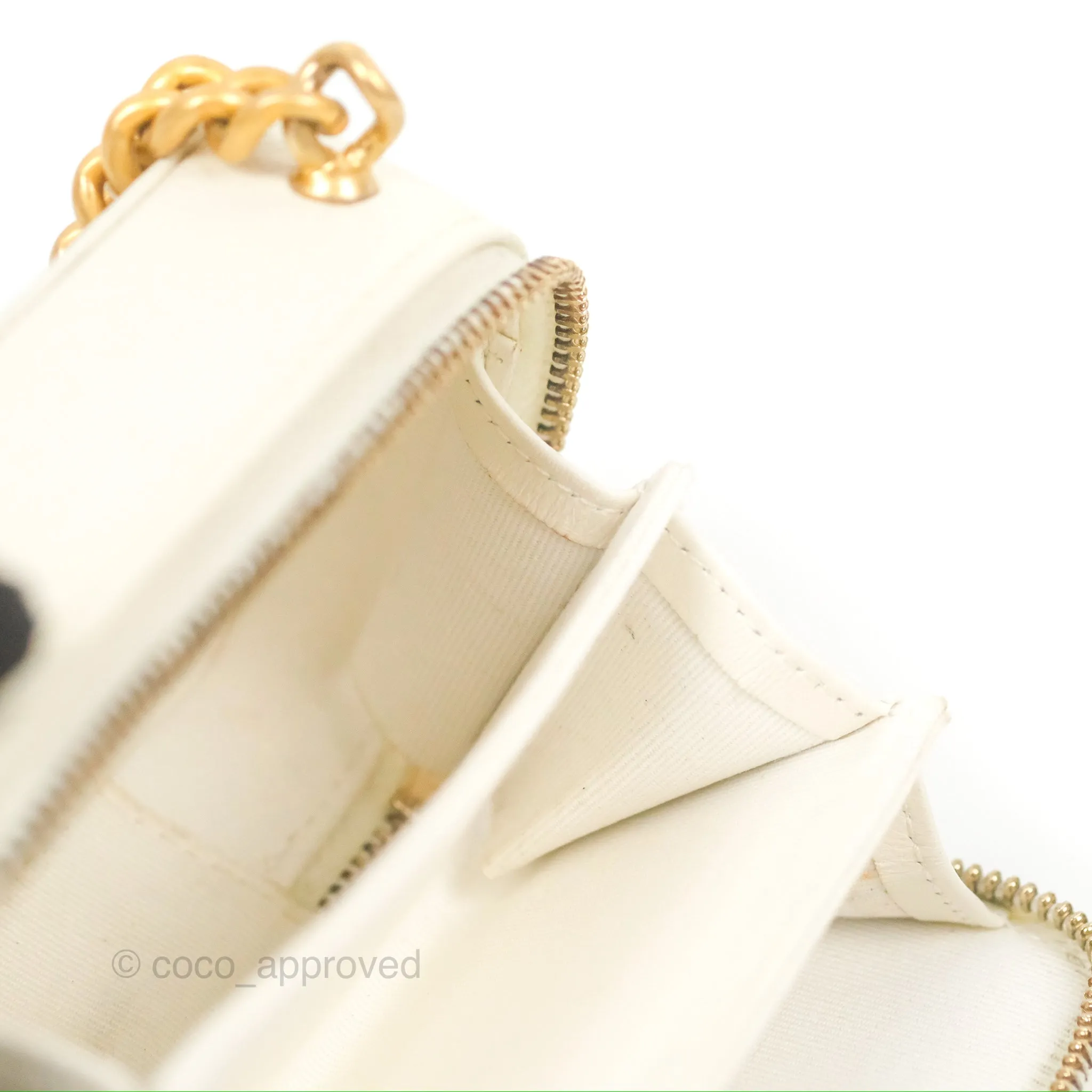 Chanel Mini Boy Clutch with Chain White Caviar Aged Gold Hardware