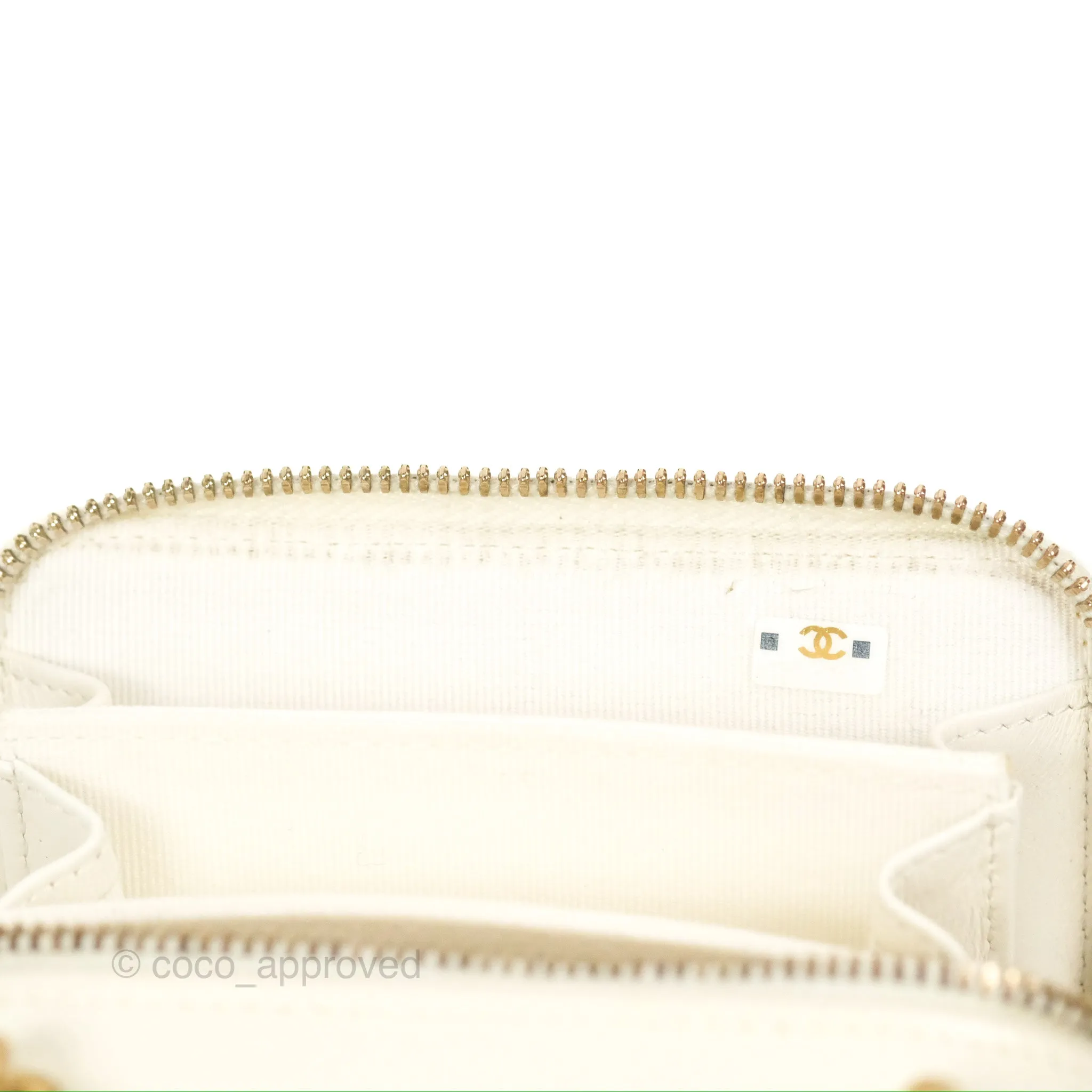 Chanel Mini Boy Clutch with Chain White Caviar Aged Gold Hardware