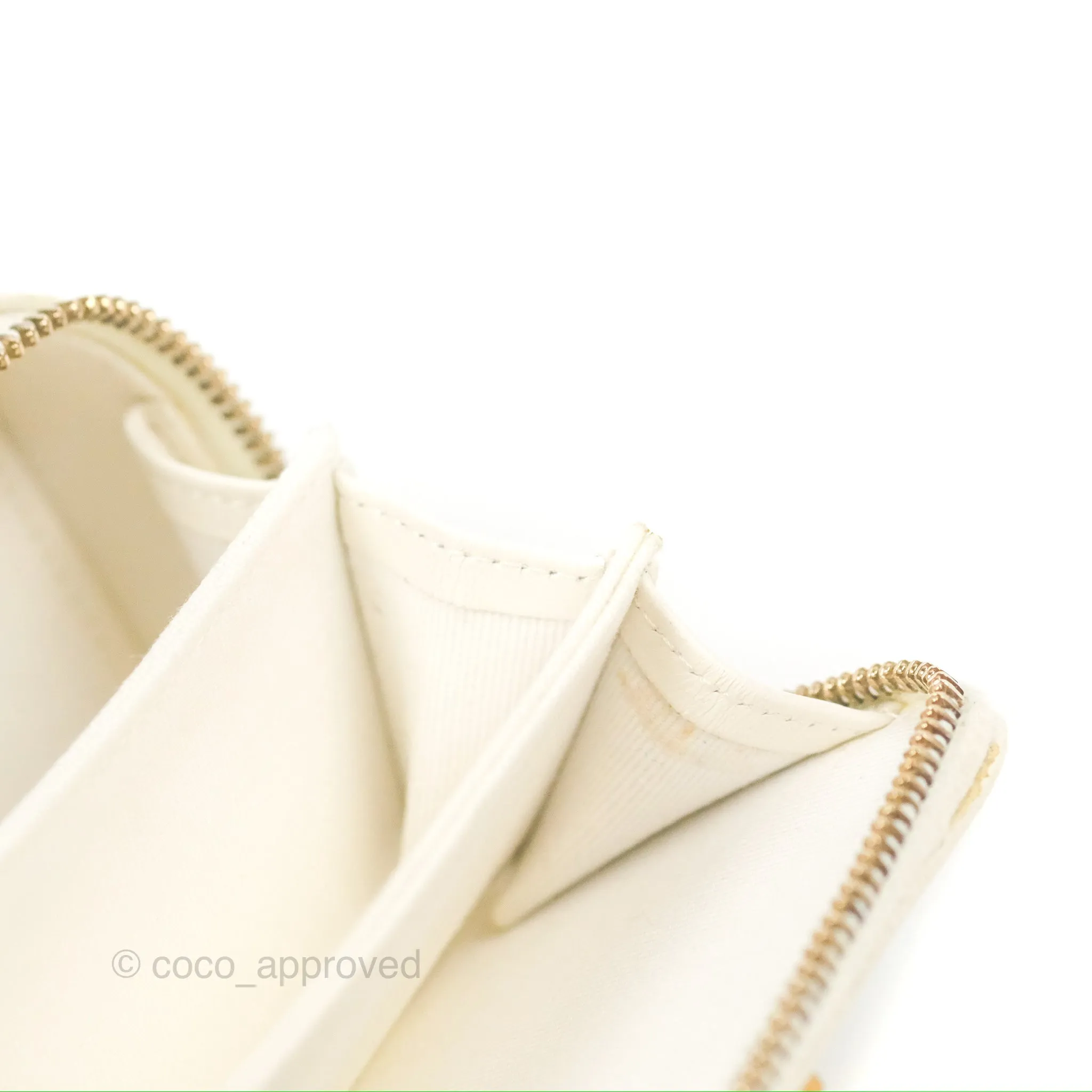 Chanel Mini Boy Clutch with Chain White Caviar Aged Gold Hardware