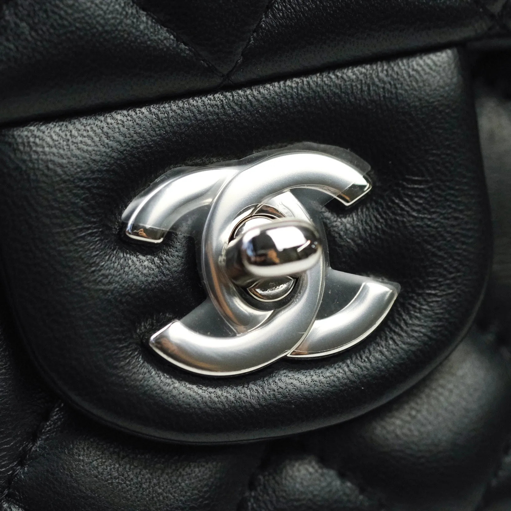 Chanel Quilted Mini Rectangular Black Lambskin Silver Hardware