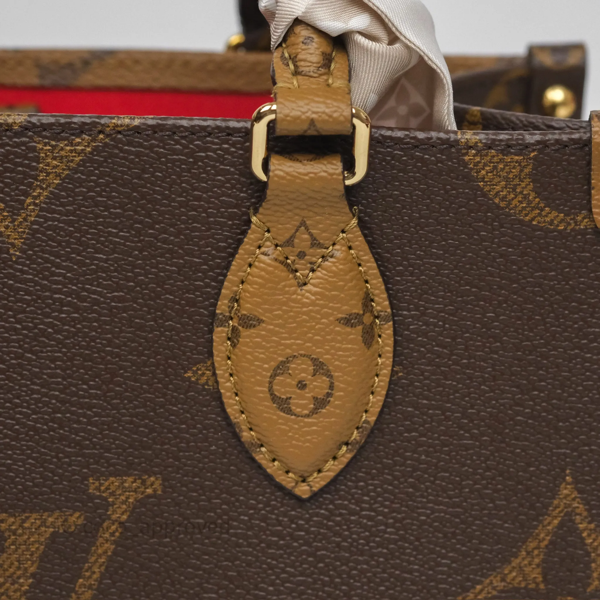 Louis Vuitton OnTheGo PM in Monogram Reverse Canvas