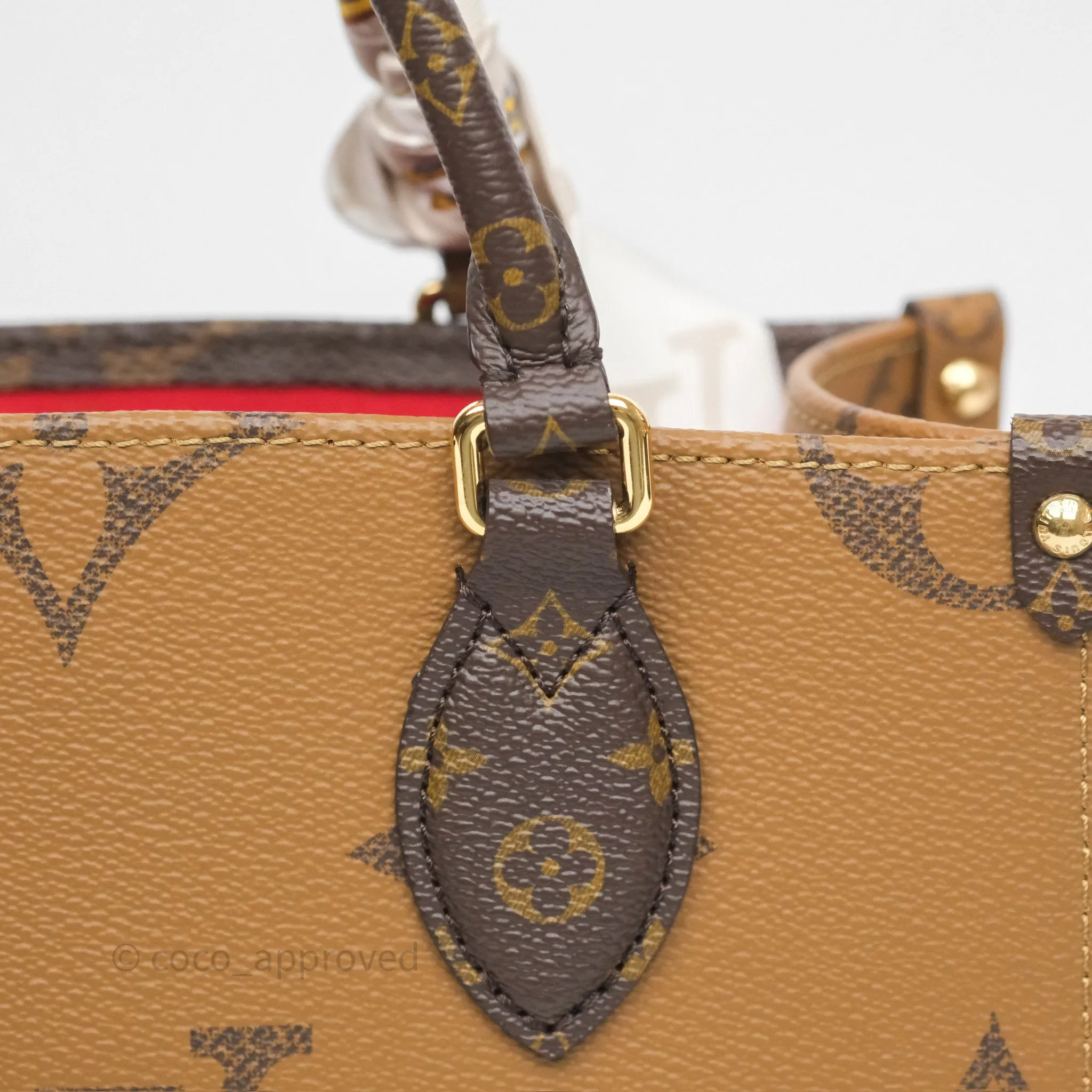 Louis Vuitton OnTheGo PM in Monogram Reverse Canvas