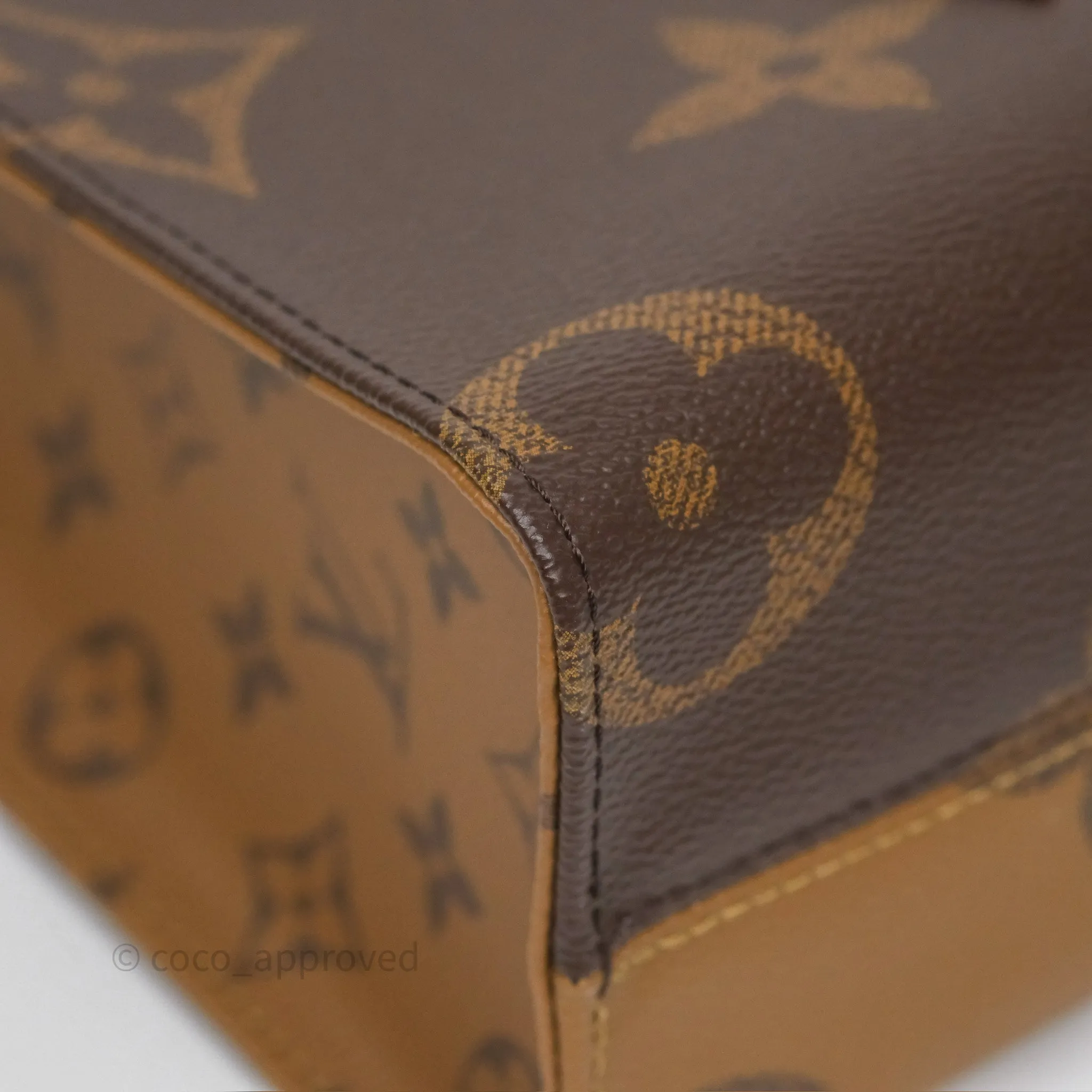 Louis Vuitton OnTheGo PM in Monogram Reverse Canvas