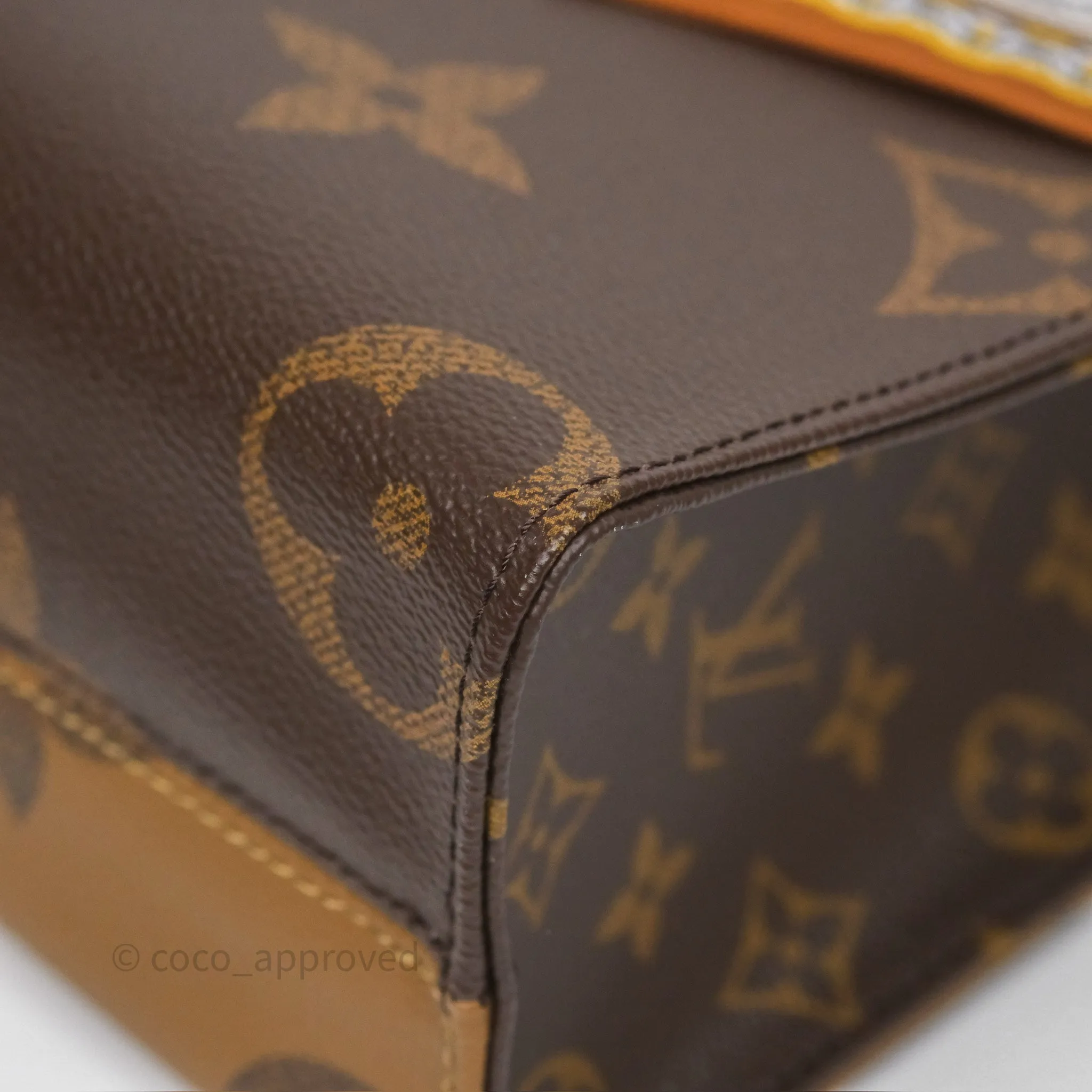 Louis Vuitton OnTheGo PM in Monogram Reverse Canvas