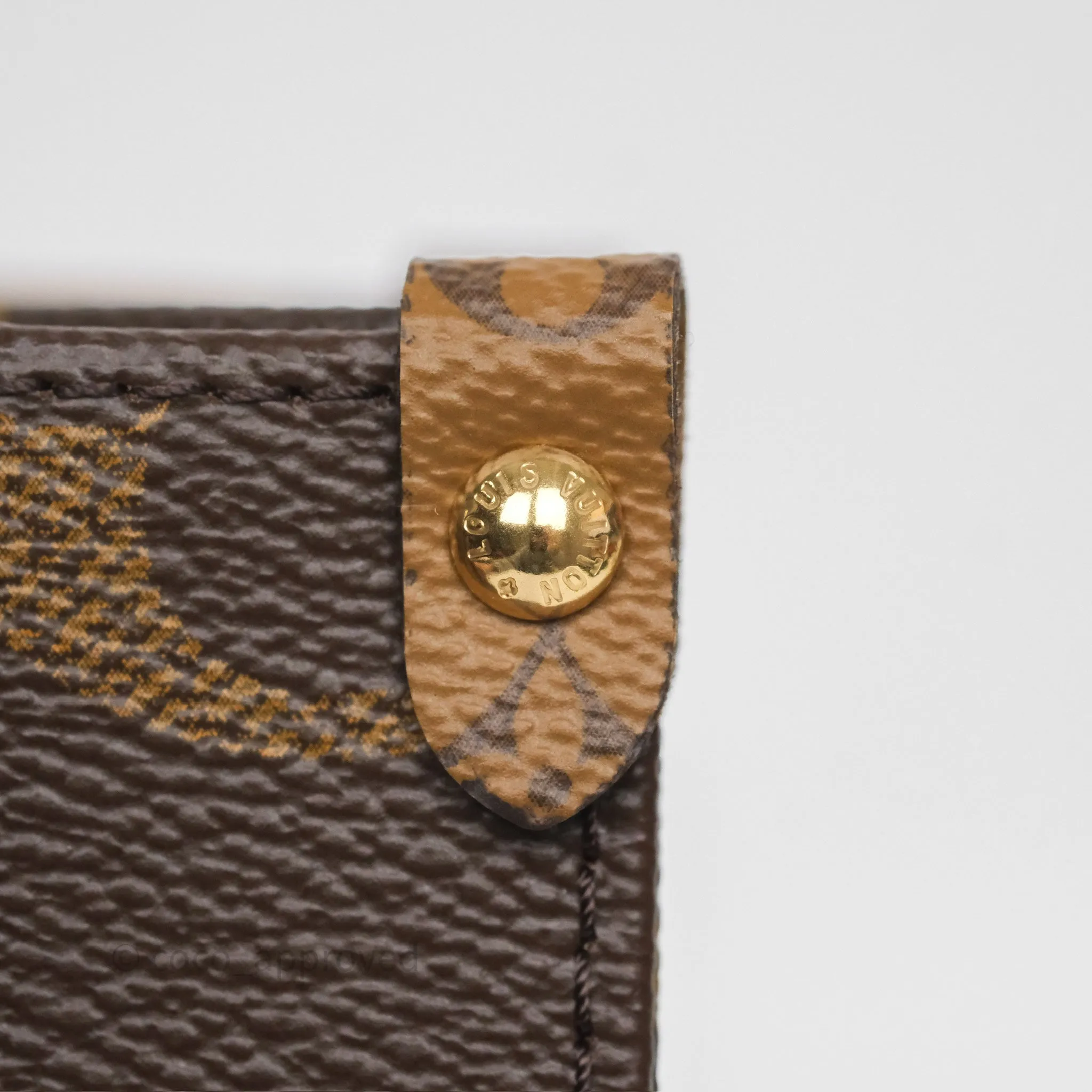 Louis Vuitton OnTheGo PM in Monogram Reverse Canvas
