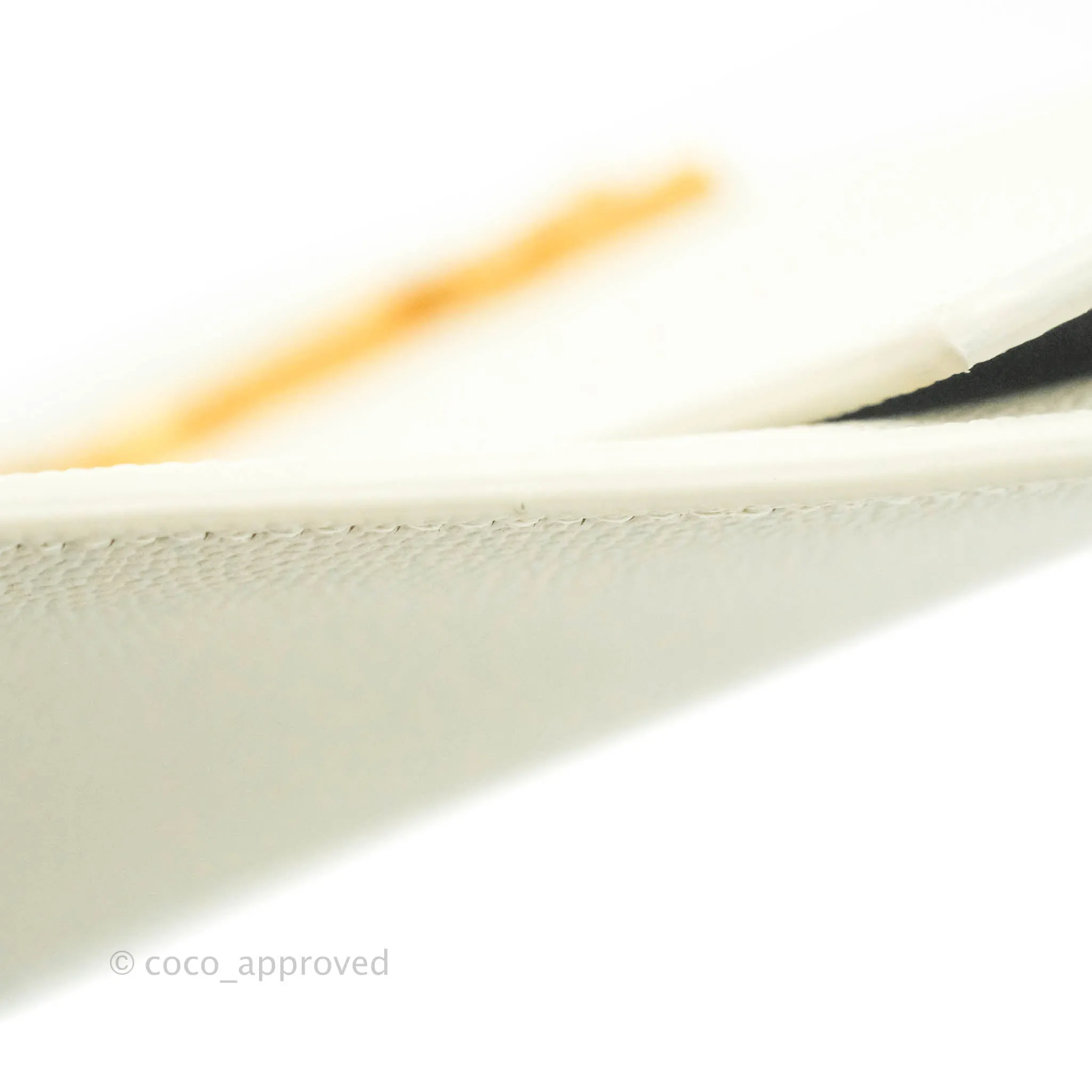 Saint Laurent Ivory Monogram Clutch Bag